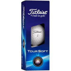 A box of Titleist Tour Soft golf balls featuring a white ball inside. The packaging has a blue design with a logo.