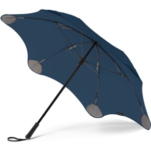 A navy blue BLUNT Coupe Umbrella with a sleek design and metallic accents, featuring a branding logo.