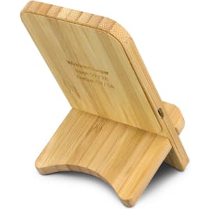 A bamboo wireless charging stand with a natural finish and a sleek design, featuring a simple wooden surface.