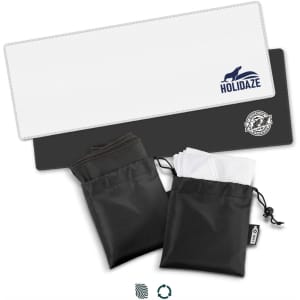Cooling towels in two colour options, one black and one white, presented in compact storage pouches. Features a logo.