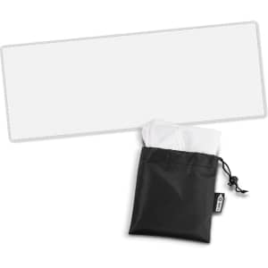 A cooling towel in white with a black storage pouch. The towel is neatly folded and stored inside the pouch.