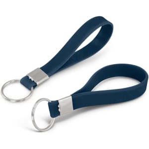 A silicone key ring in navy blue with a metal ring attachment. Features an embossed design.
