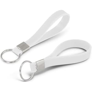 A white silicone key ring featuring a debossed design and a metal keyring attachment.