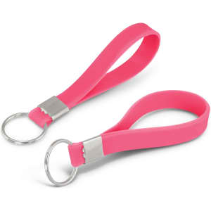 A pink silicone key ring with a smooth finish and a metal ring for attachment.