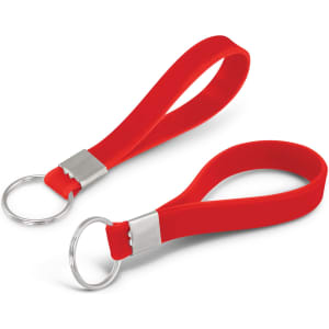 A red silicone key ring with a debossed design, featuring a metal attachment for keys.
