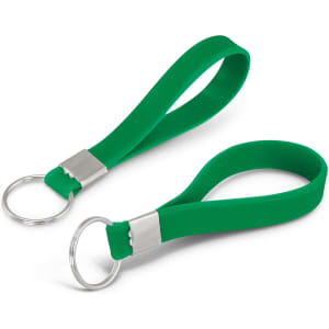 Two green silicone key rings with a metal ring attachment and a debossed design feature.