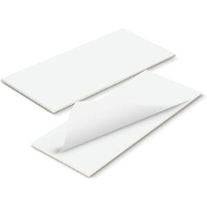 A white notepad with a full-colour cover, showing sheets that can be peeled away. It includes a branding logo.
