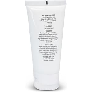 A white tube of sunscreen with a flip-top lid, featuring a logo and containing SPF 50+, 50ml.