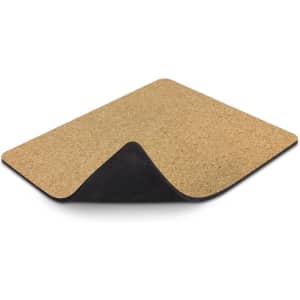 A mouse mat featuring a natural cork top and a black underside, designed for office use.