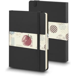 A large black hard cover notebook with an elastic band and decorative sleeve, featuring a logo.