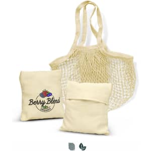 A cotton mesh foldaway tote bag in cream colour, accompanied by two small fabric pouches. Bag features a logo.