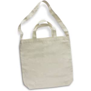 A cream-coloured cotton shoulder tote bag with long straps and short handles, featuring a subtle logo.