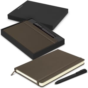A dark green Moleskine notebook and matching pen in a black gift box. The notebook features a ribbon bookmark.