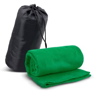 A green fleece blanket neatly rolled and packaged in a black carry bag with a drawstring.