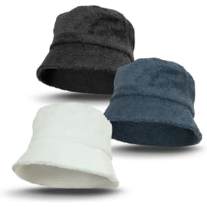Three bucket hats in black, navy, and white terry towelling, featuring a soft, textured fabric and a logo.