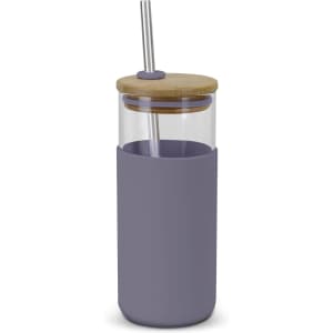 A glass tumbler with a light purple silicone sleeve, a bamboo lid, and a stainless steel straw.