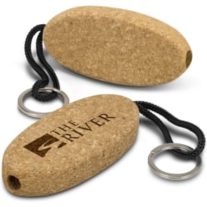 A cork floating key ring in an oval shape with a black cord and metal key ring, featuring a logo.