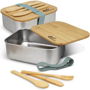 A stainless steel lunch box with a bamboo lid and cutlery, featuring a green strap.