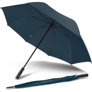A dark blue umbrella laid open beside its matching folded cover, featuring a handle and a small logo.
