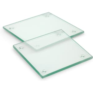 A set of two square glass coasters, featuring a clear and glossy finish with rounded corners.