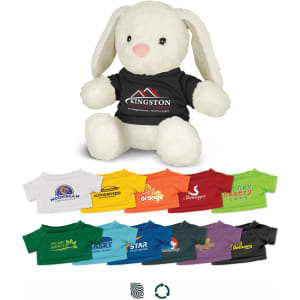 A white plush rabbit toy wearing a black shirt, surrounded by various brightly coloured shirts in different shades.