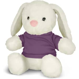 A fluffy white rabbit plush toy wearing a purple shirt, sitting upright with soft, floppy ears.