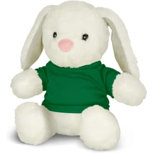 A white plush rabbit with long ears, wearing a green shirt. The toy is seated and has black eyes and a pink nose.
