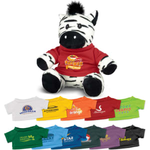 A zebra plush toy wearing a red shirt, with various colourful shirts displayed below it. The toy is black and white.