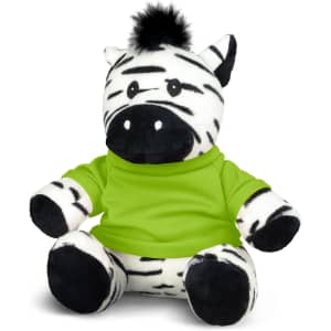A plush zebra toy dressed in a bright green shirt, featuring black and white stripes and a tuft of black fur on its head.