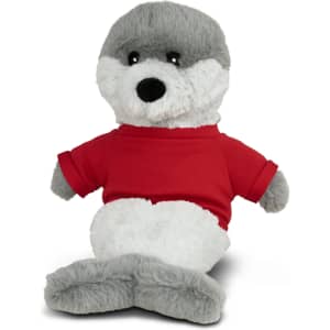 A grey and white seal plush toy wearing a red shirt, sitting upright with a friendly expression.