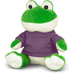 A green frog plush toy wearing a purple shirt, seated with wide eyes and a friendly expression.