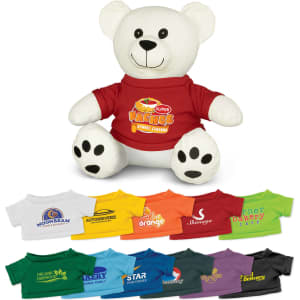 A white plush bear wearing a red shirt, alongside various coloured shirts in multiple styles. The bear has black paws and a friendly expression.