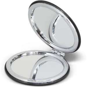 A compact mirror with a sleek black exterior and a shiny silver frame, opened to reveal two reflective surfaces.