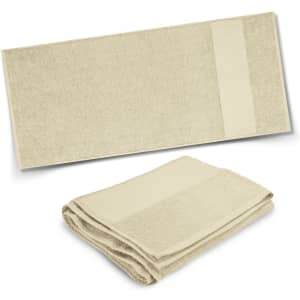A beige towel set featuring a folded towel and a longer towel, with a simple design and a logo.