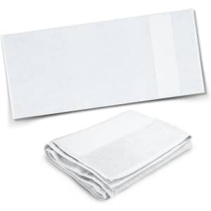 A set of white Marina Terry Towels, featuring a plain design with a textured section. One towel is neatly folded.