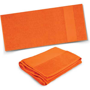 An orange towel displayed unfolded and folded, featuring a textured surface and a solid band. It has a logo.