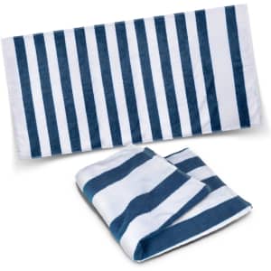A navy and white striped beach towel, featuring a smooth texture and a folded version at the bottom.