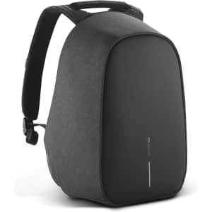 A grey backpack with a sleek design and a logo, featuring adjustable straps and a side pocket.