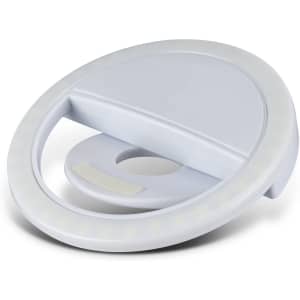 A round, white selfie phone light with a built-in stand and a circular design, featuring LED lights around the edge.