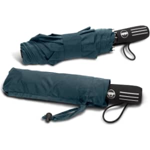 A dark green compact umbrella with a black handle and logo, neatly folded for storage.