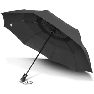 A black Metropolitan umbrella with a sturdy frame and a handle, featuring a logo on the handle.