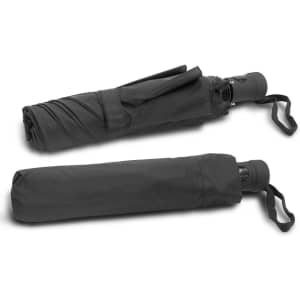 A black tri-fold umbrella, compactly folded with a strap for easy carrying. The umbrella features a handle and a logo.