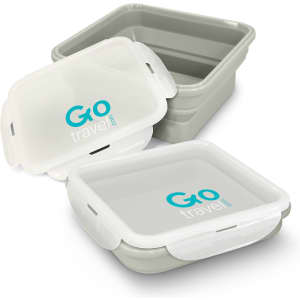 A grey collapsible lunch box with a transparent lid. Features a logo on the lid and two stacked boxes.