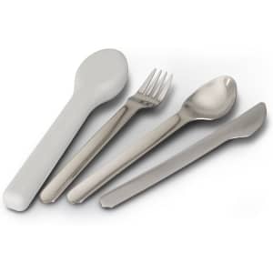A travel cutlery set featuring a grey spoon, fork, knife, and silver serving spoon, with a logo on one piece.