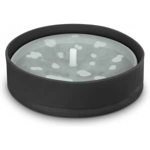 A grey microwave popcorn popper with a black base and white central element. It features a logo on the side.