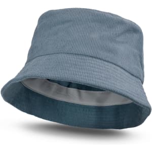 A blue corduroy bucket hat with a wide brim, featuring a lined interior and a subtle logo design.
