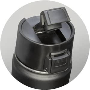 A drink bottle featuring a black vacuum design with a flip-top lid and a handle for easy carrying.