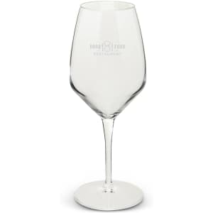 A clear wine glass with a tall stem and a rounded bowl, featuring a logo on one side.