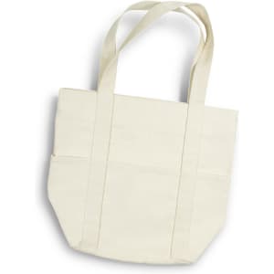 A cream canvas tote bag with two side pockets and long handles. It has a minimalist design and a logo.