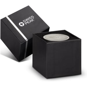 A compact grey speaker in a sleek black box with a logo on the packaging.